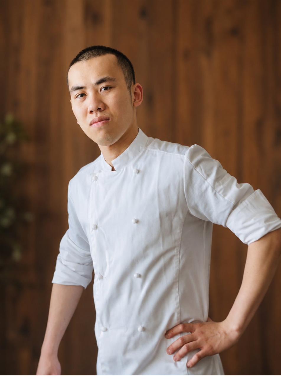 Portrait of Desmond Ho in chef's whites