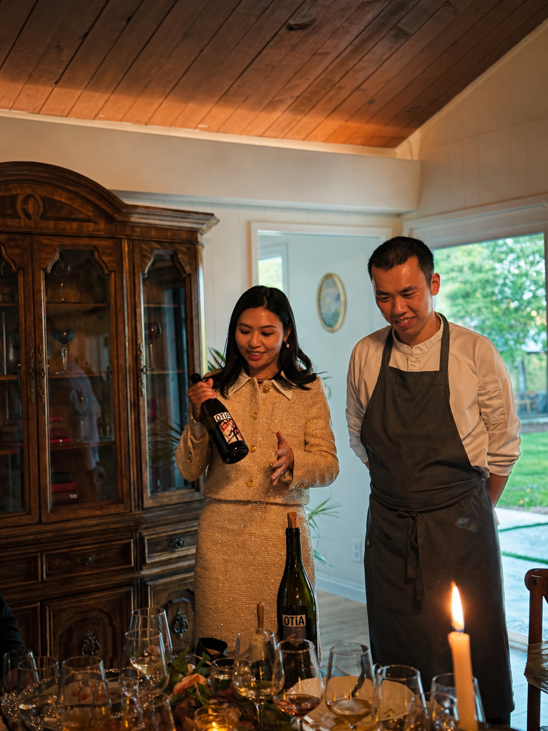 Chef Desmond Ho and the host preparing wine service for the intimate dinner